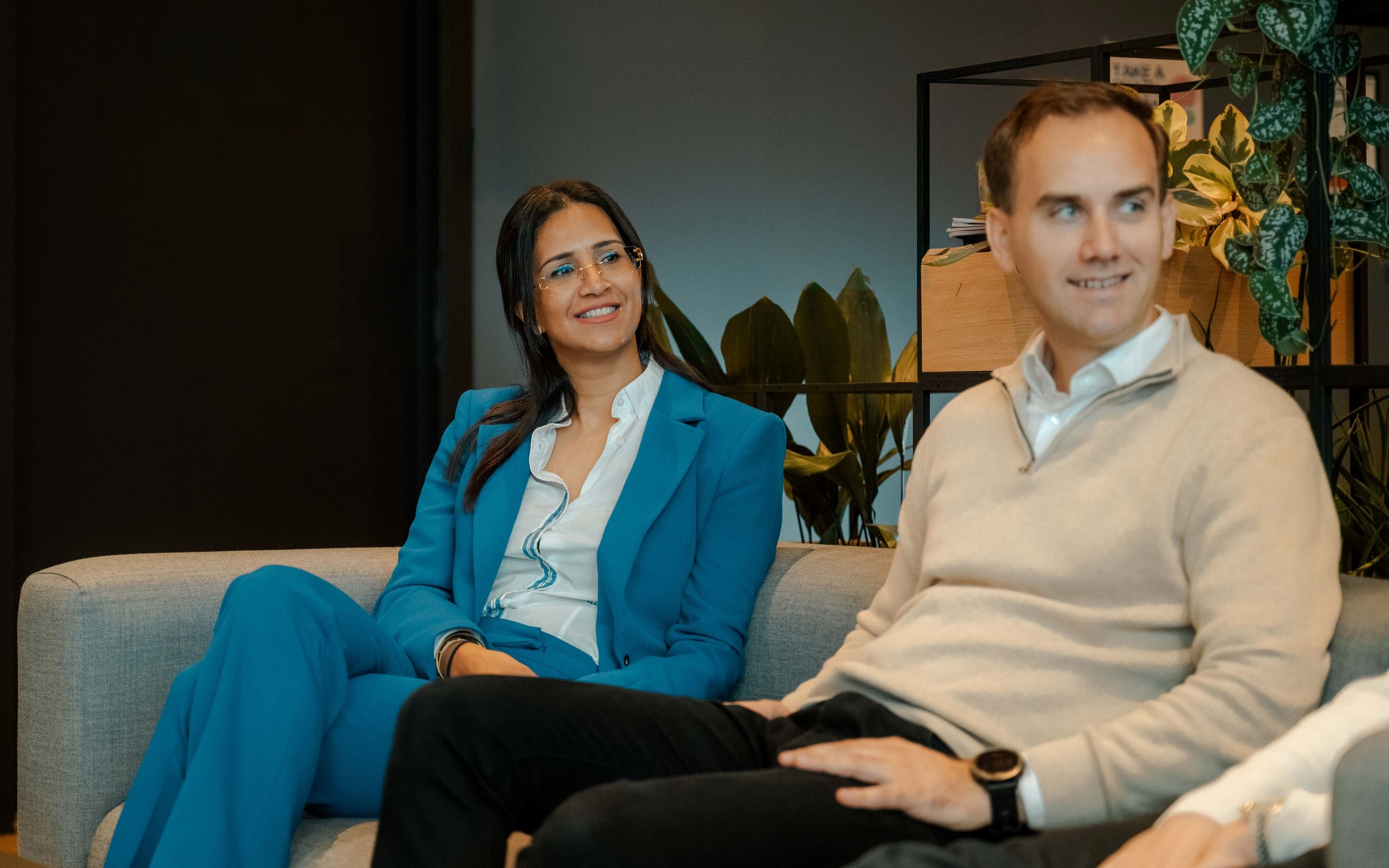 Two colleagues sitting on a couch